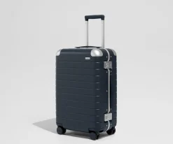 The Aluminum Edge Bigger Carry-On in Navy Blue