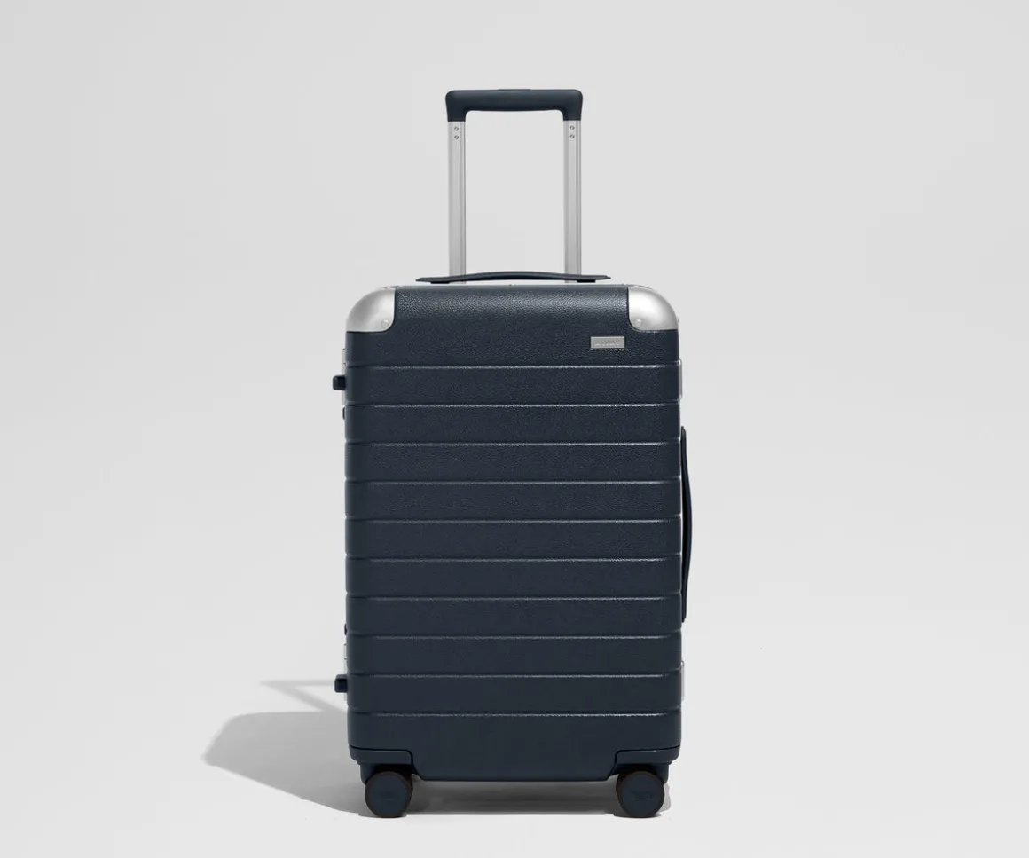 The Aluminum Edge Bigger Carry-On in Navy Blue