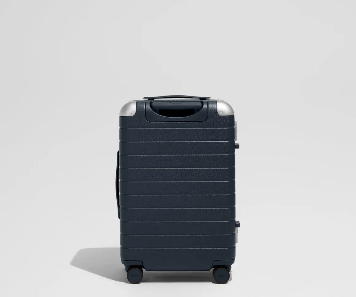 The Aluminum Edge Bigger Carry-On in Navy Blue