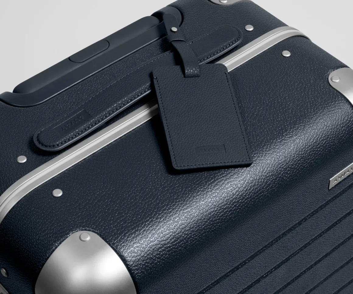 The Aluminum Edge Bigger Carry-On in Navy Blue