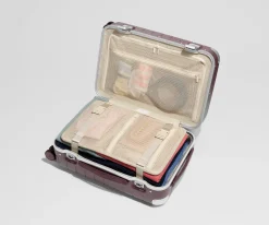 The Aluminum Edge Carry-On in Oxblood Red