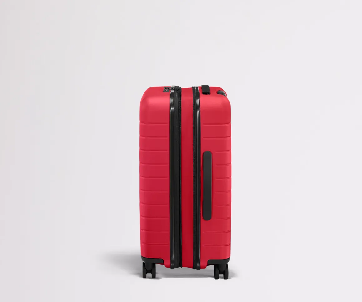 The Bigger Carry-On Flex in Cherry Red