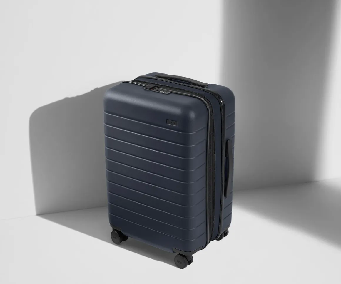 The Bigger Carry-On Flex in Navy Blue