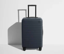 The Bigger Carry-On Flex in Navy Blue