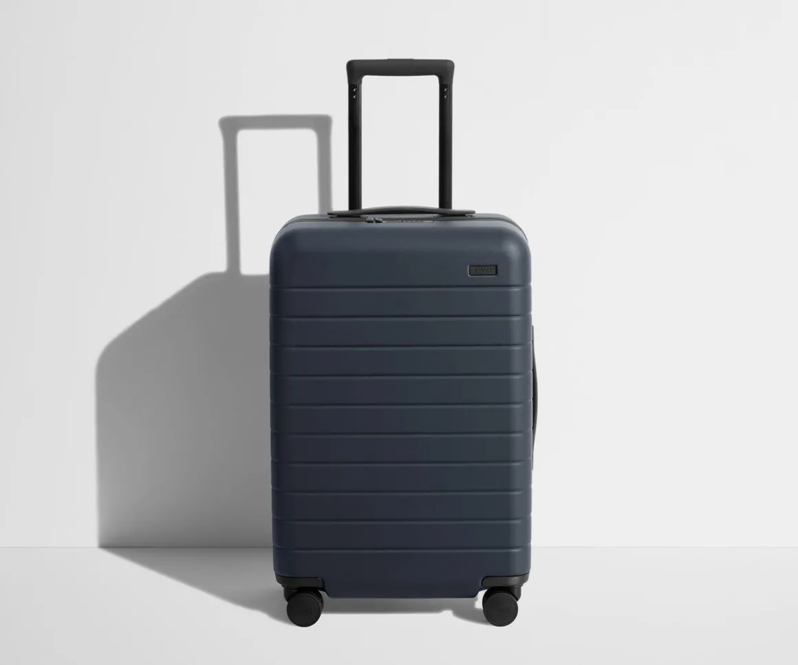 The Bigger Carry-On Flex in Navy Blue