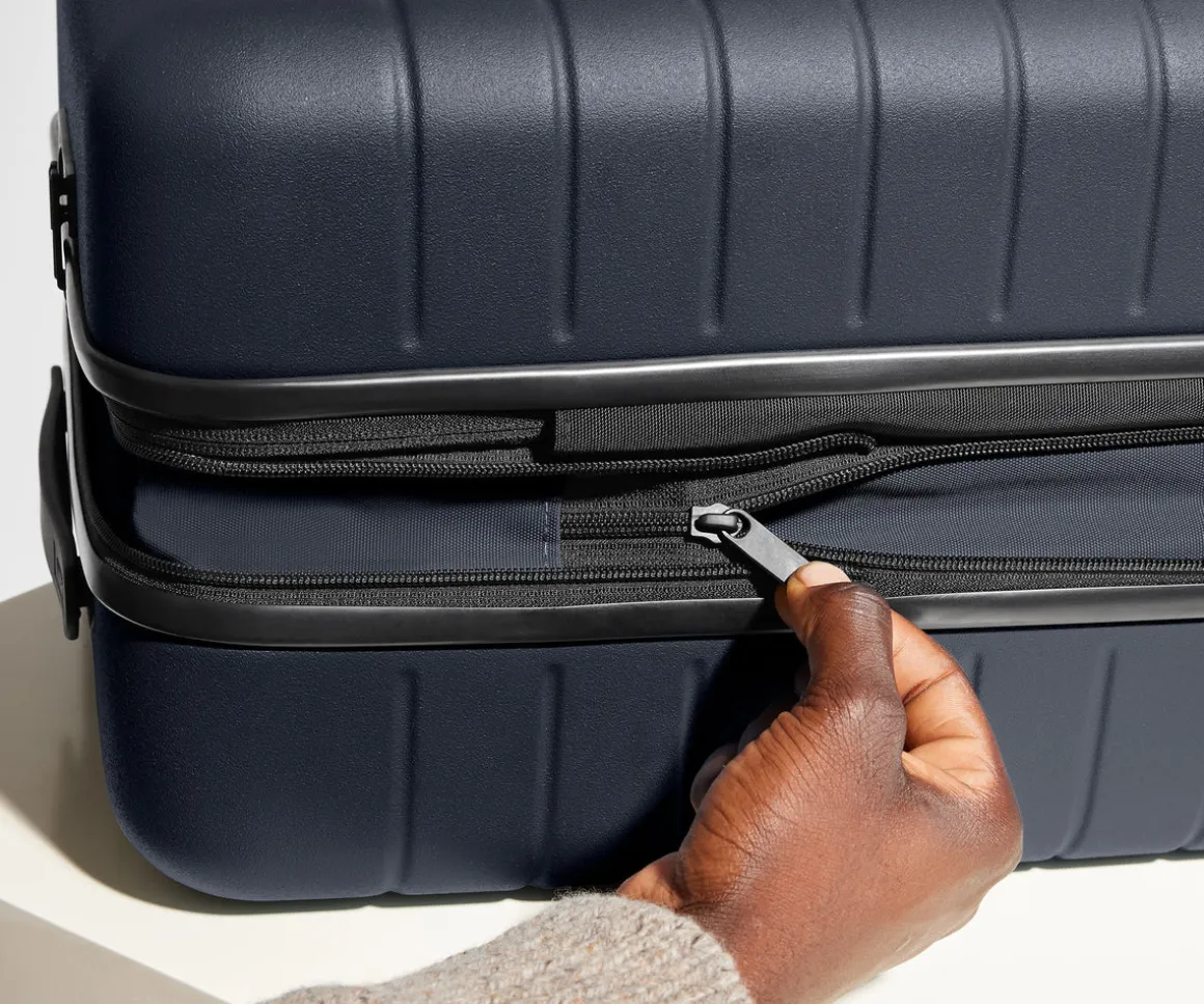 The Bigger Carry-On Flex in Navy Blue