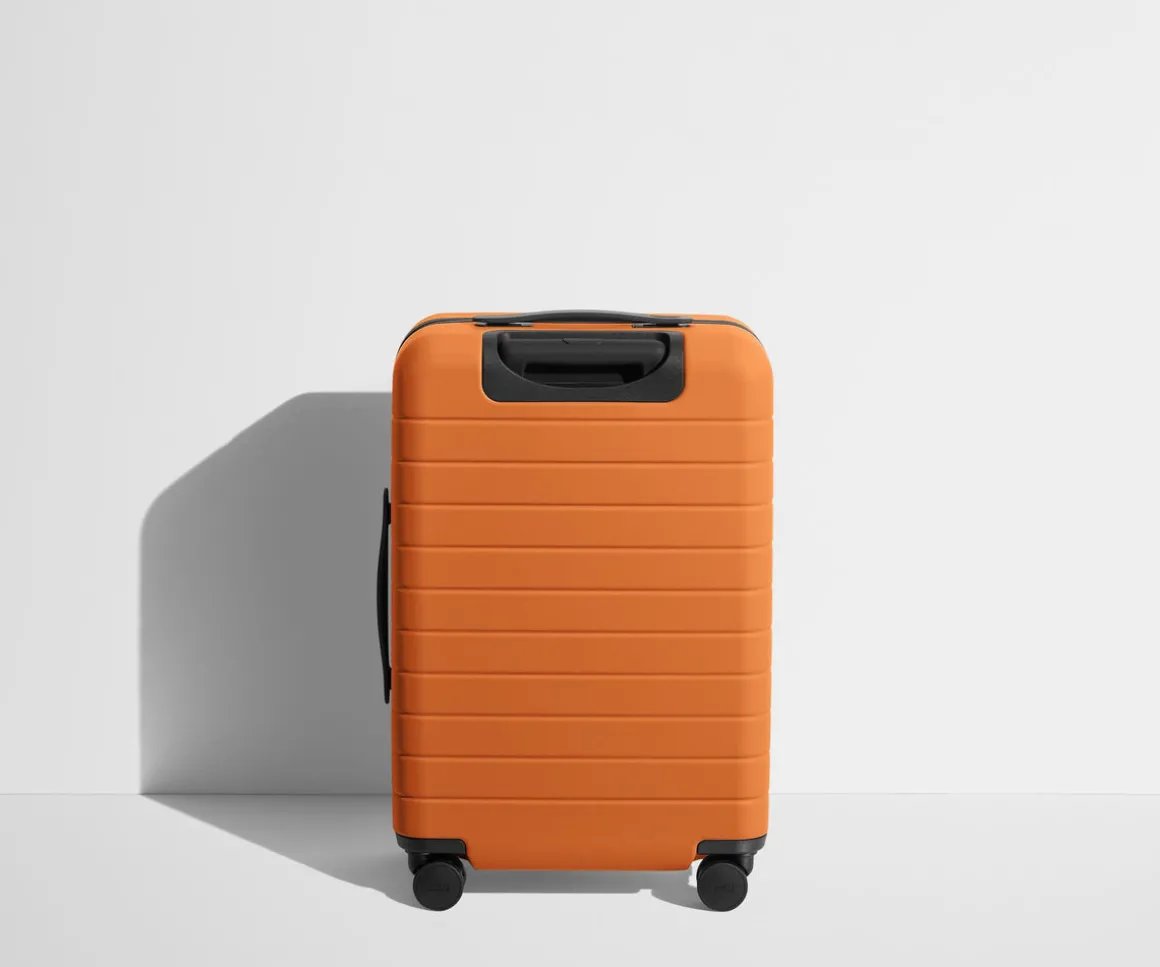 The Bigger Carry-On Flex in Sorbet Orange