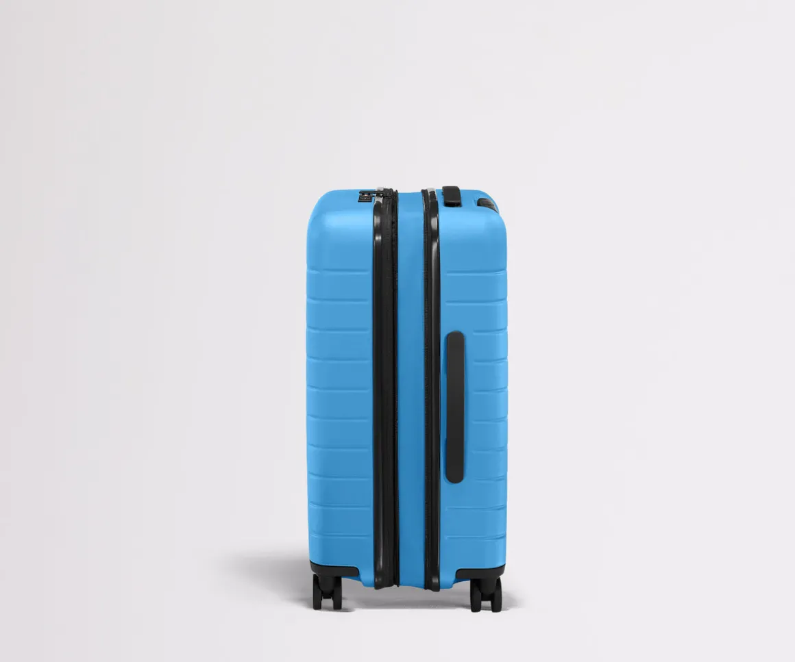 The Bigger Carry-On Flex in Splash Blue