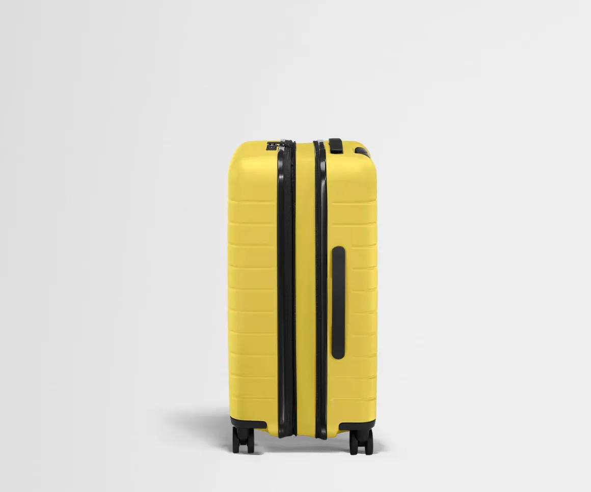 The Bigger Carry-On Flex in Sunshine Yellow